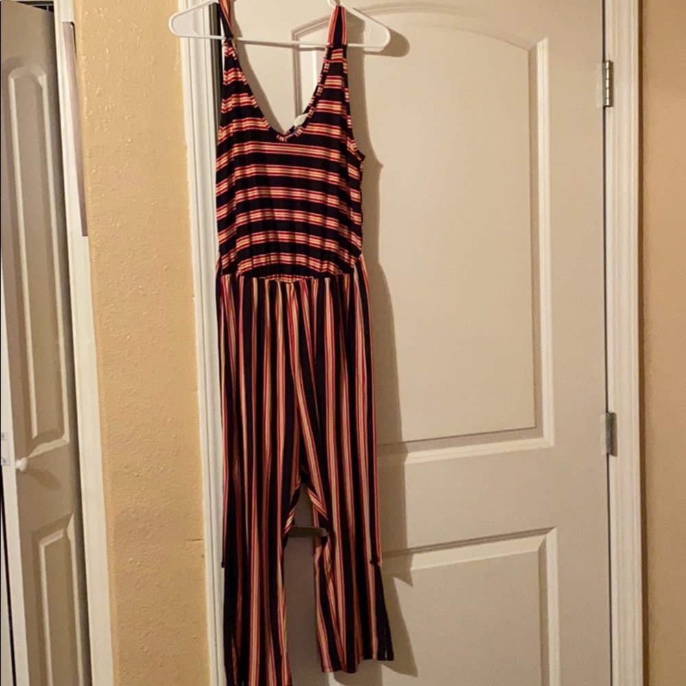 Red, mustard yellow, black striped jumpsuit